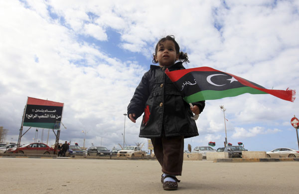 Two years after start of revolt, Libyans celebrate