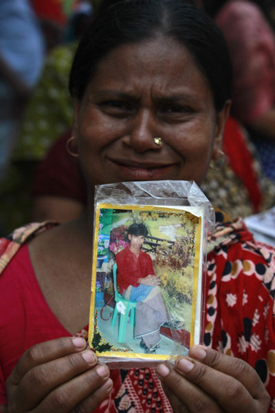 Bangladesh building collapse kills nearly 100