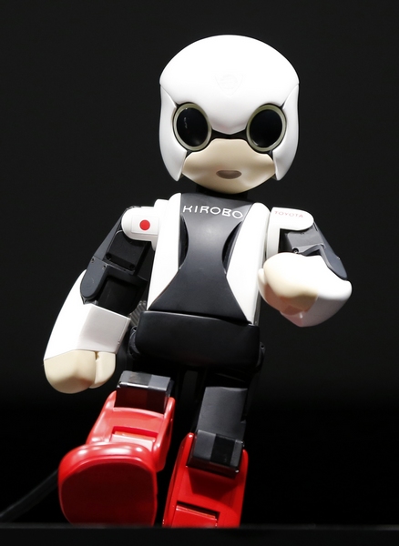Humanoid communication robot Kirobo moves during its unveiling in Tokyo June 26, 2013. Japan develops robot astronaut