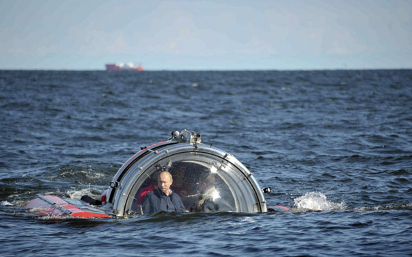 Russia's Putin takes a dive to boost his image
