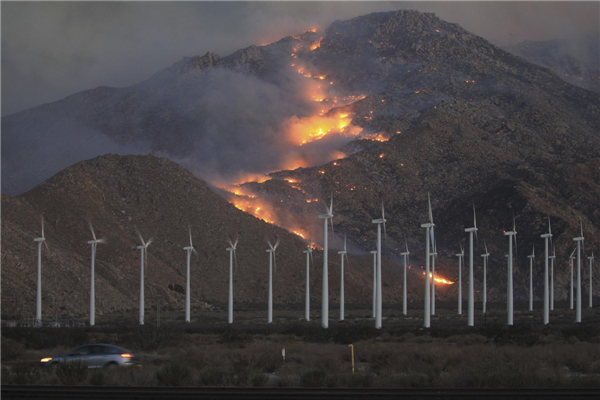 California wildfire destroys 26 homes