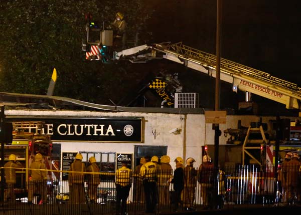 8 dead in police helicopter crash onto Glasgow pub