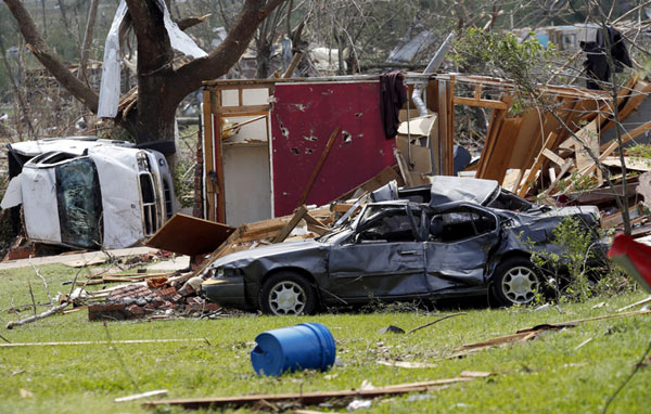 Death toll rises as storms tear through south US