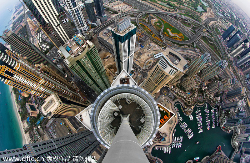 Daredevils taking selfie over Dubai skyscraper