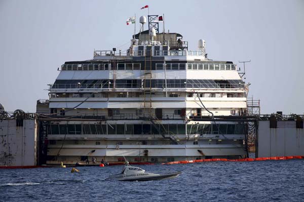 Shipwrecked Costa Concordia refloated