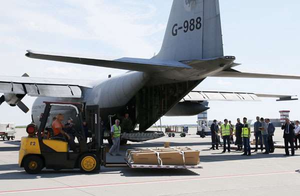 Plane with MH17 bodies en route to Netherlands