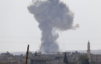 US-led air strikes killed 553 in Syria, 32 civilians