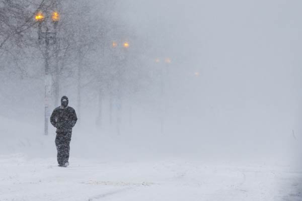 US Northeast hit by blizzards after record snow