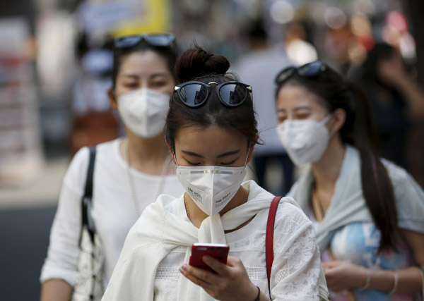 South Korea cuts rates as MERS clouds outlook; 14 new cases