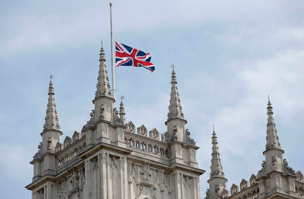 Britain falls silent to remember 30 killed in Tunisian gun attack