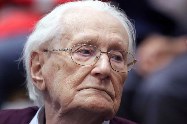 Former Auschwitz bookkeeper, 94, found guilty