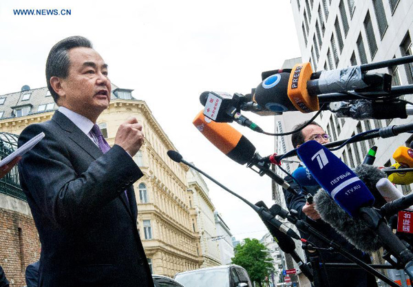 Chinese FM urges parties involved to honor nuke deal promises