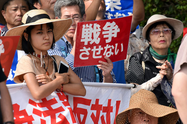 Thousands protest against Japanese gov't-backed security bills