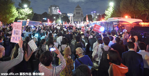 Thousands protest against Japanese gov't-backed security bills