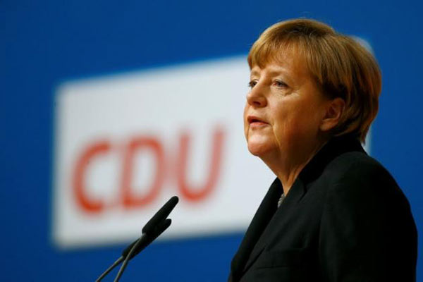 Merkel pledges to reduce refugee inflow