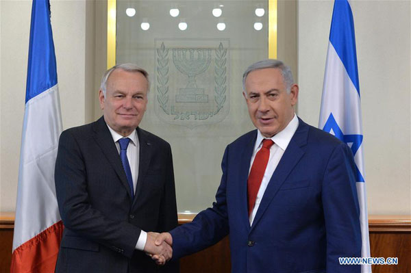 Netanyahu tells French FM his country still opposes peace conference