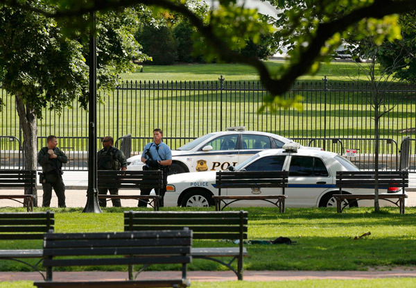 White House on lockdown after shooting nearby, Obama off site