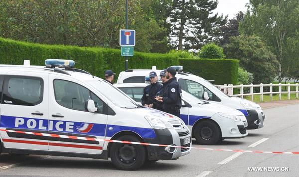 French president says killing of police officer 'incontestably terrorist act'