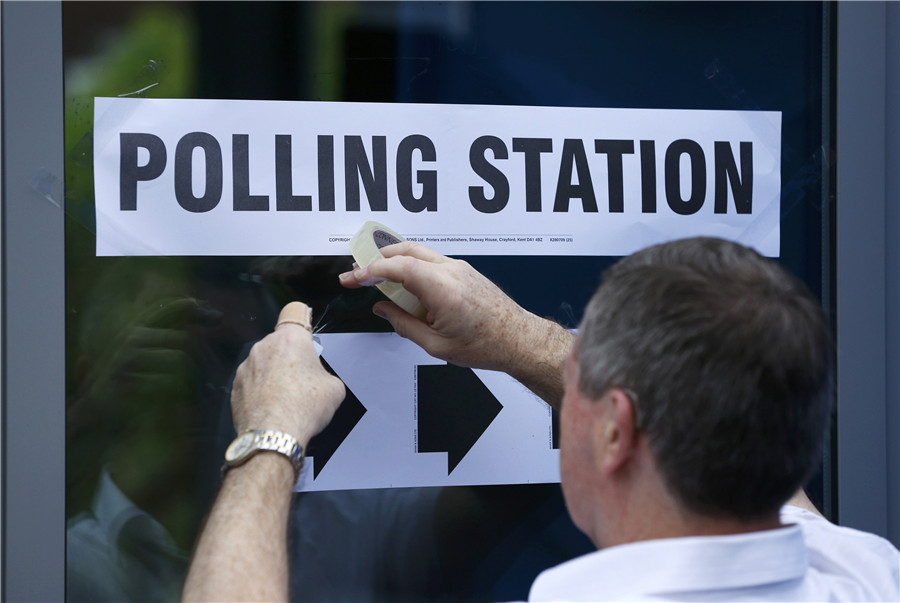 EU referendum underway in Britain as polling stations opened