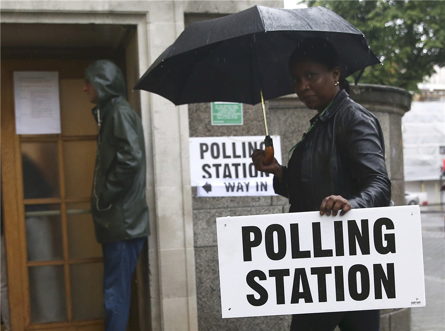 EU referendum underway in Britain as polling stations opened