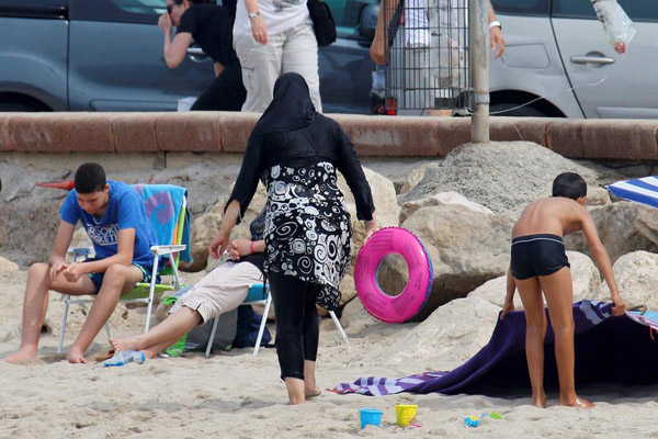 Troubled Europe debates burqas, niqabs and burkinis