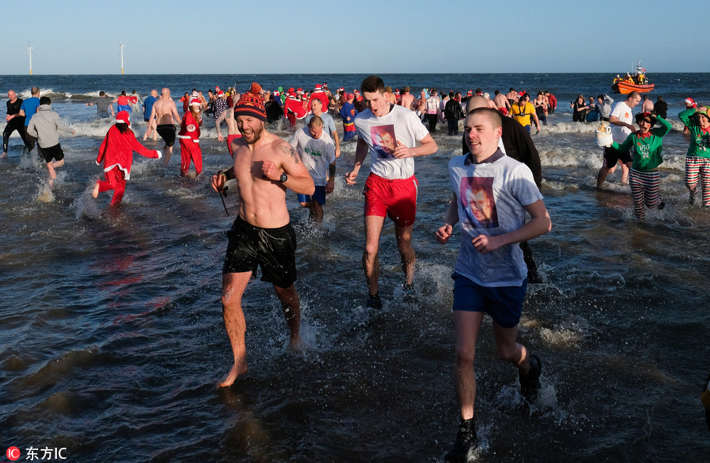 Boxing Day swimmers brave icy North Sea