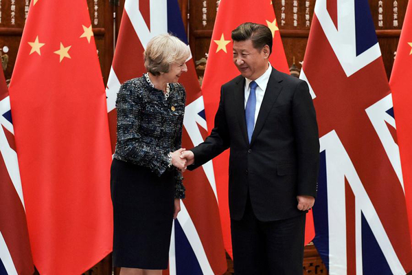 China invites Britain's May to visit 'at appropriate time'