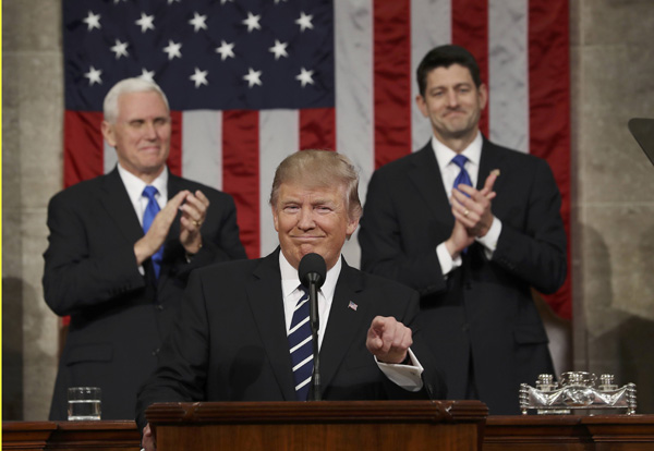 Trump opens door to immigration reform, urges tax cuts in speech