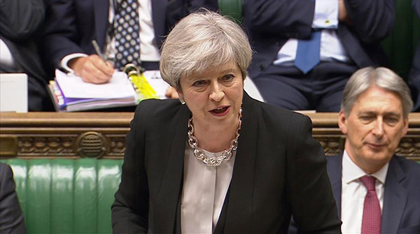 May wins House of Commons backing for snap general election