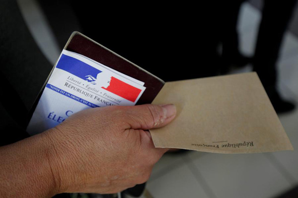 Polls open in France's runoff presidential election