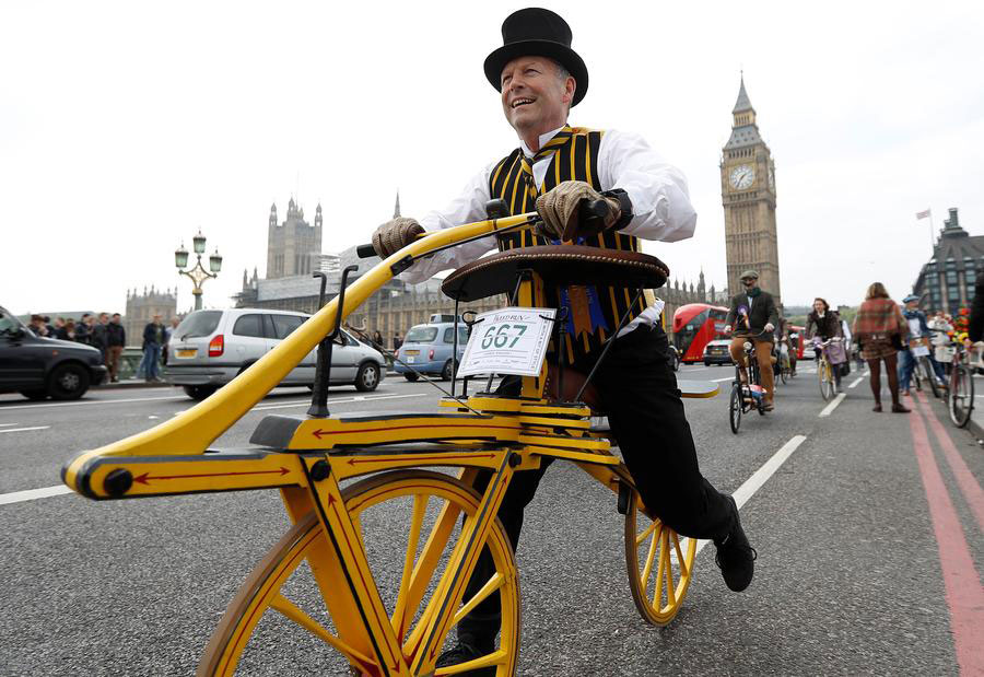 Hundreds of cyclists ride through The Tweed Run in London