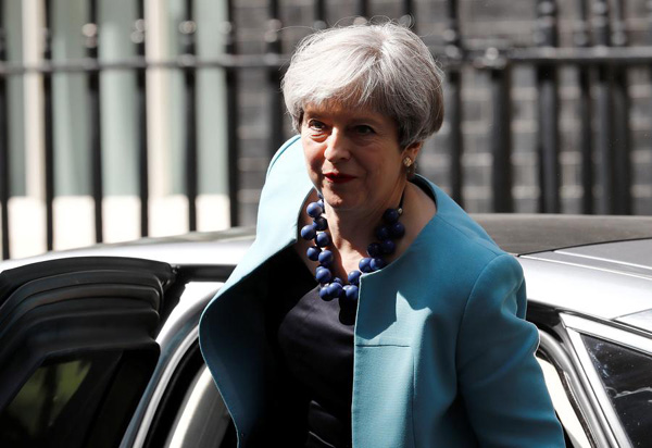 UK PM May says DUP talks continue but London fire a real focus