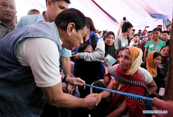 Duterte apologizes to displaced families from Marawi for declaring martial law
