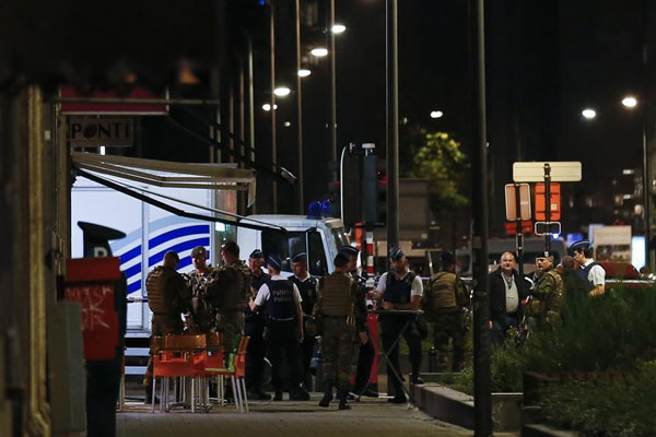 'Terrorist'attacker dies after being shot by soldiers in Brussels