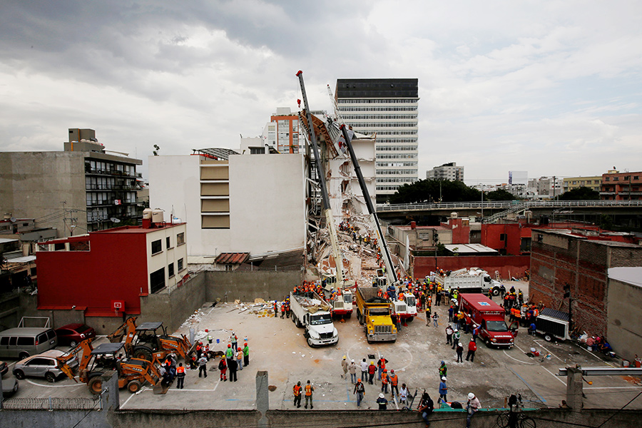 Mexicans dig through collapsed buildings as quake kills 225