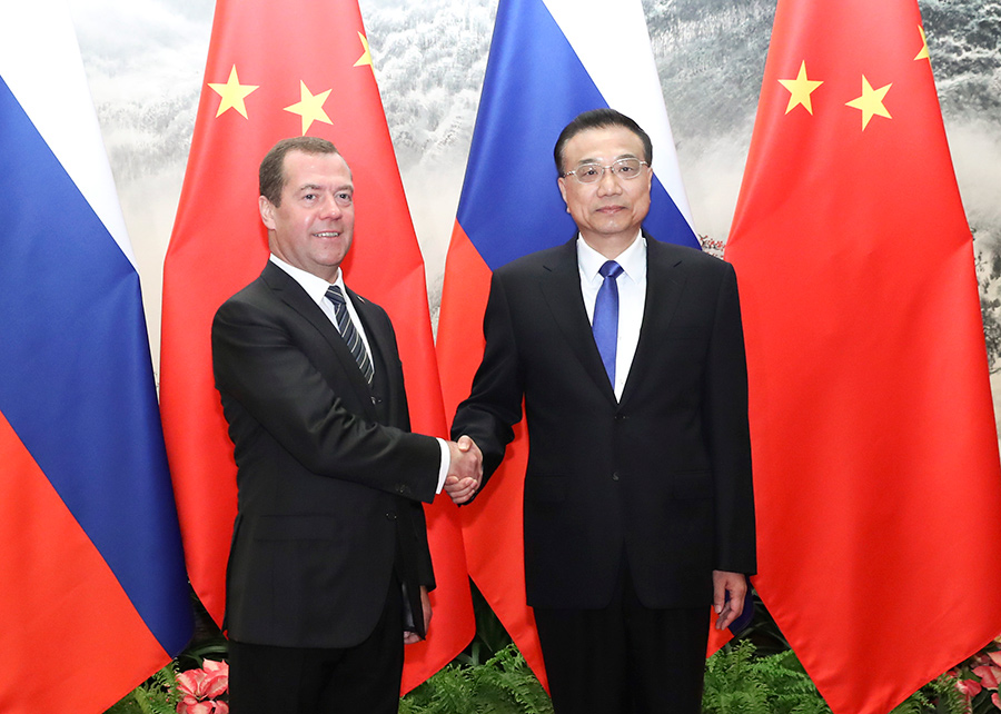 Medvedev packs busy schedule in Beijing