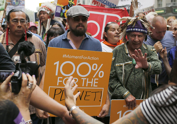 Tens of thousands crowd New York streets for climate march