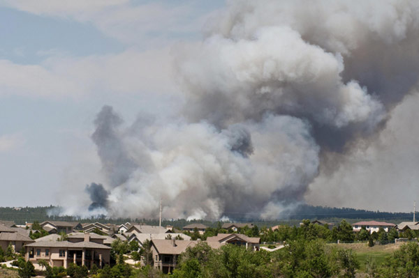 Thousands evacuated following Colorado forest fires