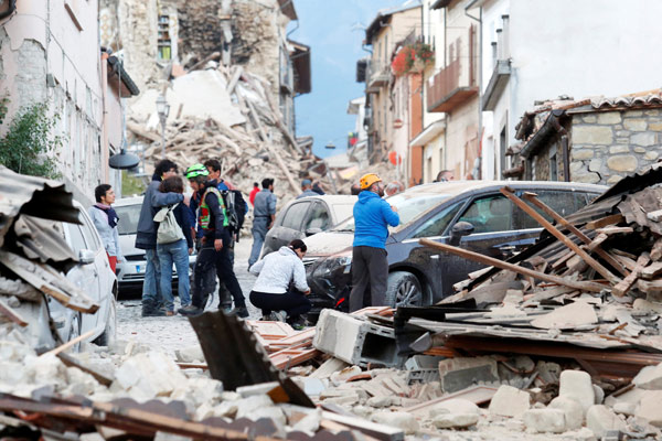 'Voices under the rubble' after quake hits Italy; at least 73 dead