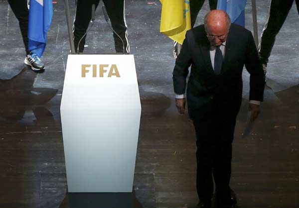 Blatter defies calls to quit as FIFA scandal widens