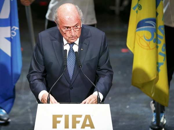 Blatter defies calls to quit as FIFA scandal widens