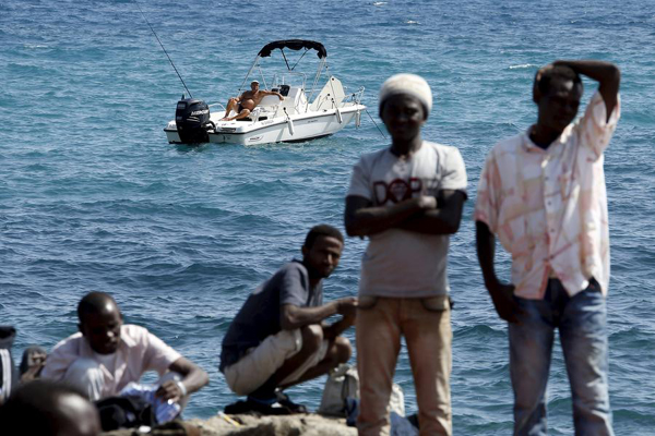 Migrant crisis deepens in Italy, interior minister urges EU response
