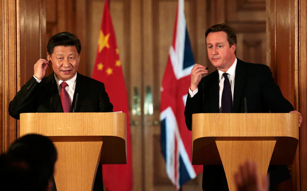 China, UK sign landmark deals