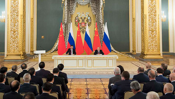 Xi, Putin pin hopes on NGOs, media, business for closer ties