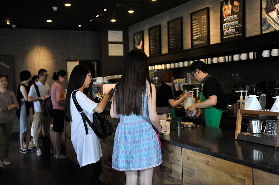 Starbucks, office rents and CEOs form alternative outlook on China