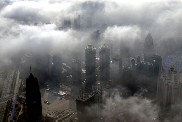 Fog clouds Shanghai's skyscrapers