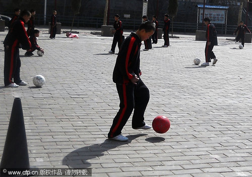 Teaching monks the art of football