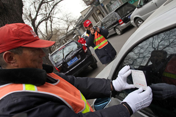 Beijing raises parking fee to reduce traffic