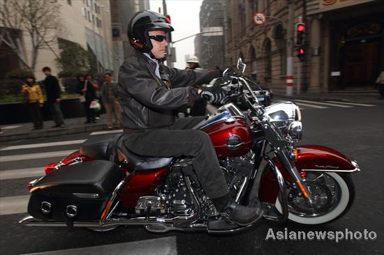 US ambassador bids farewell on a Harley