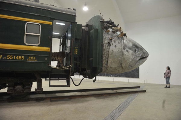 Fish-headed train steams into art gallery